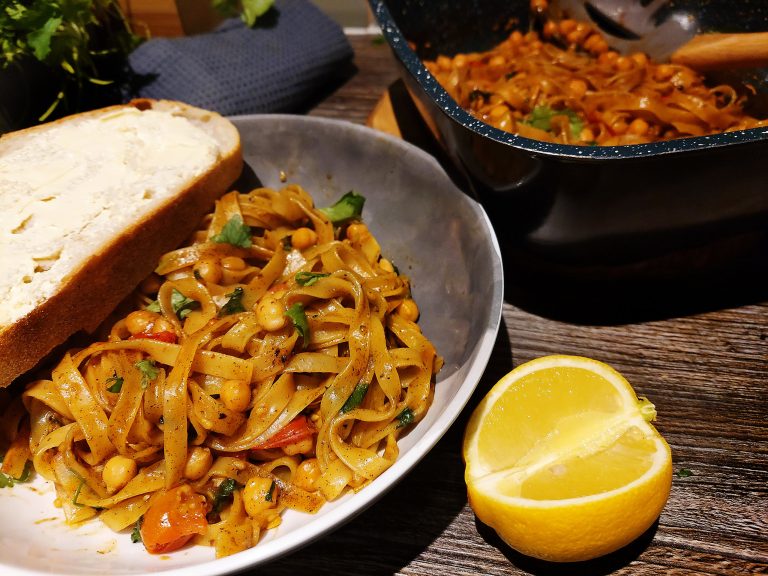 Fried Tagliatelle with Chickpeas and Tomatoes in Cajun Oil