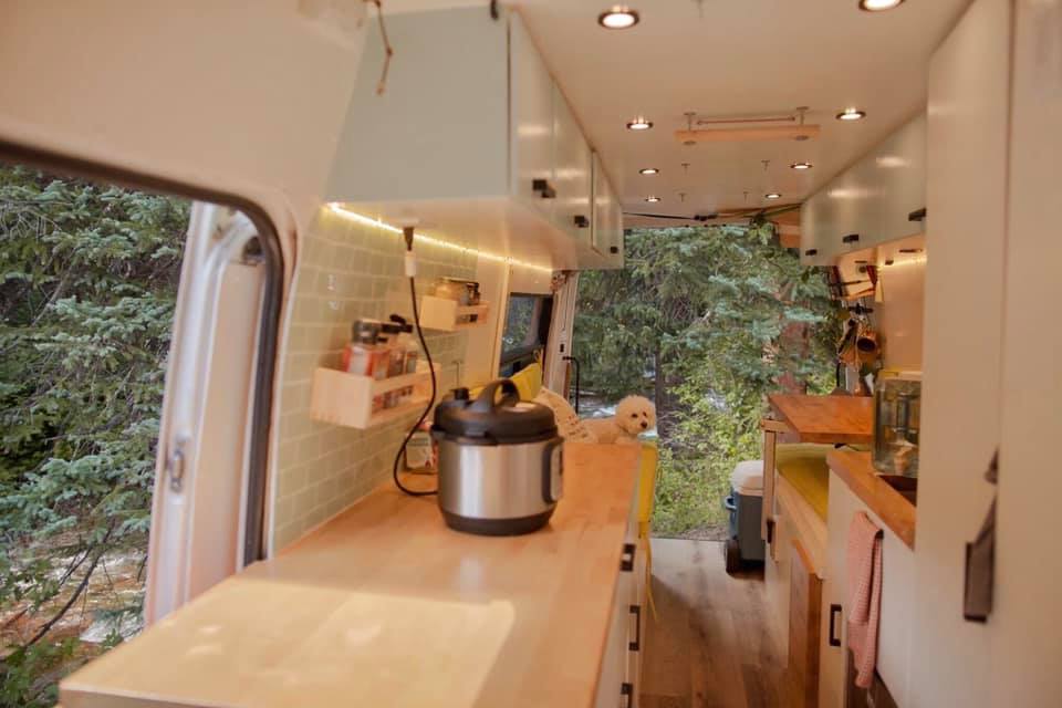 Instant pot plugged in a campervan kitchen