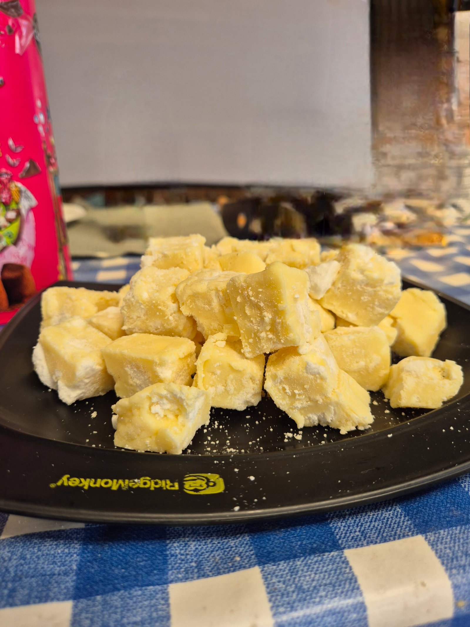 White chocolate and lemon meringue fudge Lemon meringue fudge piled on a plate